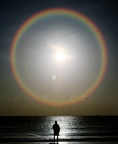 Circle Rainbow over water