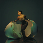 Megan hatching out of egg